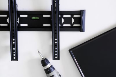 Handyman Installing a Shelf